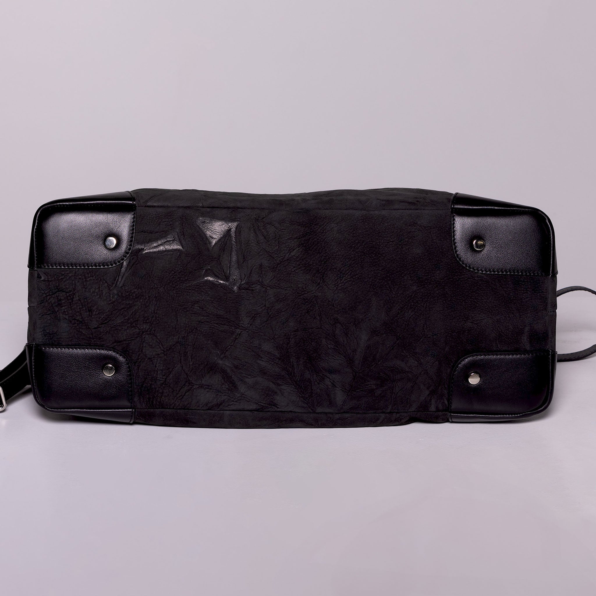 Vesta Maxi Tote Ebony protective base studs detail black nubuck-effect leather with contrasting textures