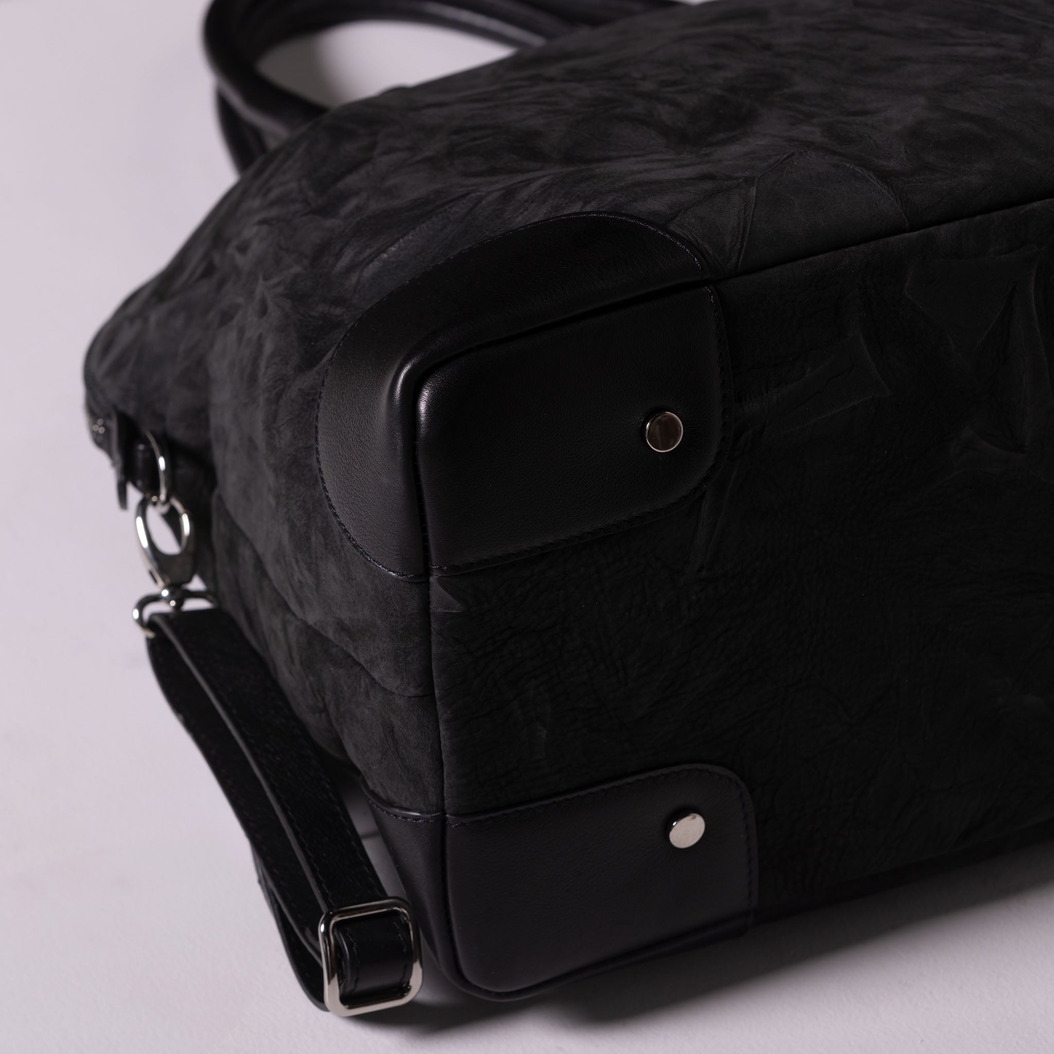 Vesta Maxi Tote Ebony protective base studs detail black nubuck-effect leather with contrasting textures